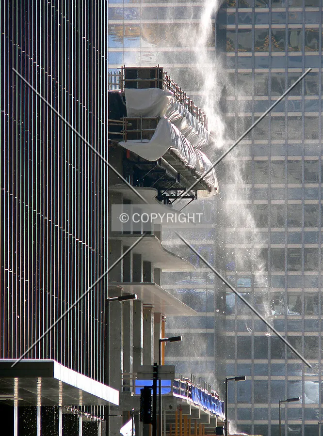 View from the north as snow blows off the structure