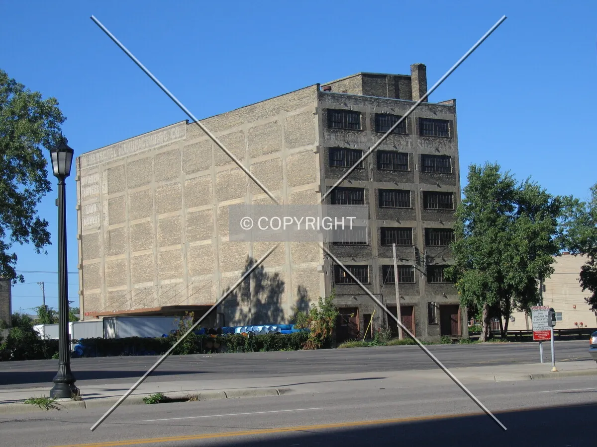 Rear facade from Washington Avenue, showing concrete framing, before renovation