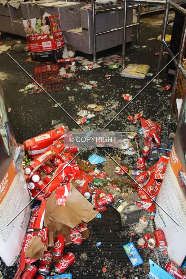 Store entrance after vandalism during the Michael Brown protests; November 25, 2014