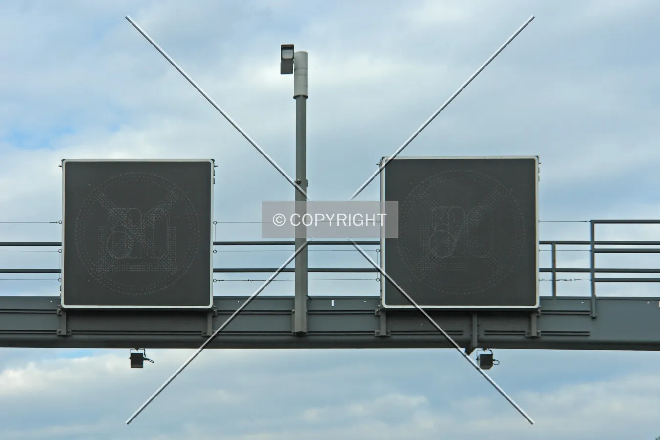 Electronic signage and video camera on a gantry
