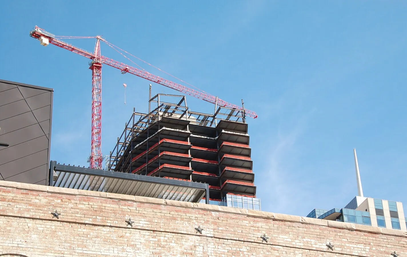 Upper floors peering over the roofline