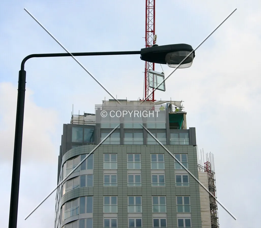 View east of the top from Osnaburgh Street showing installation of one of the last façade panels