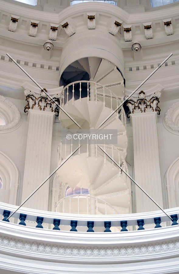 Looking up at the circular stairway inside the dome from the ground floor rotunda
