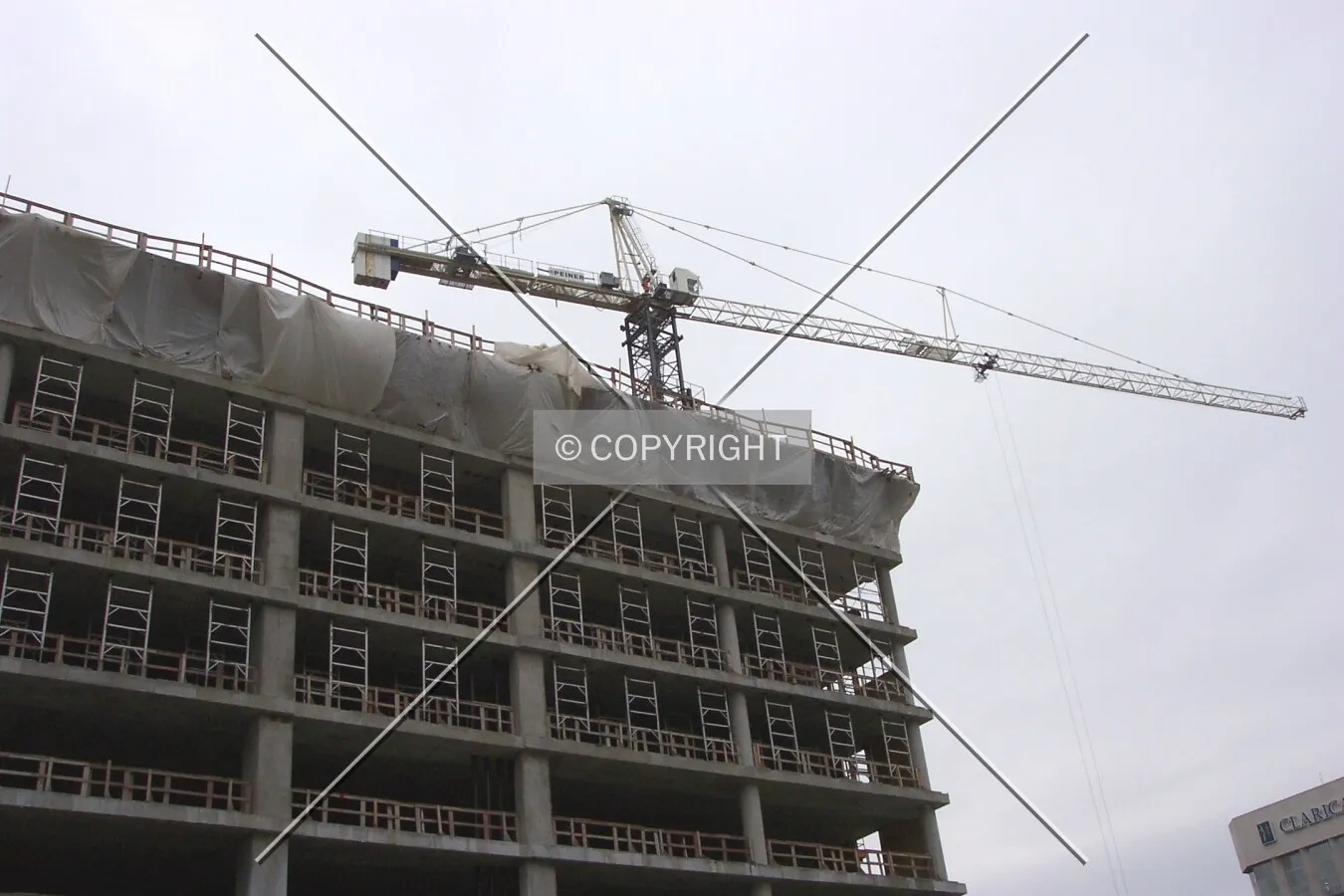 The top few floors (crane in background)
