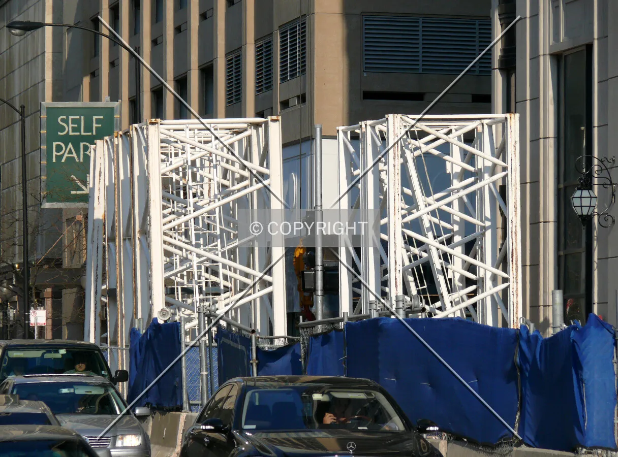 Tower crane sections along Walton Street