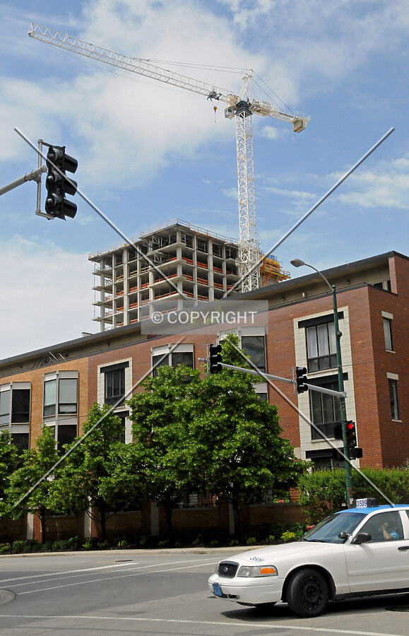 Upper floors of the present structure viewed from the intersection of Des Plaines and Fulton Streets