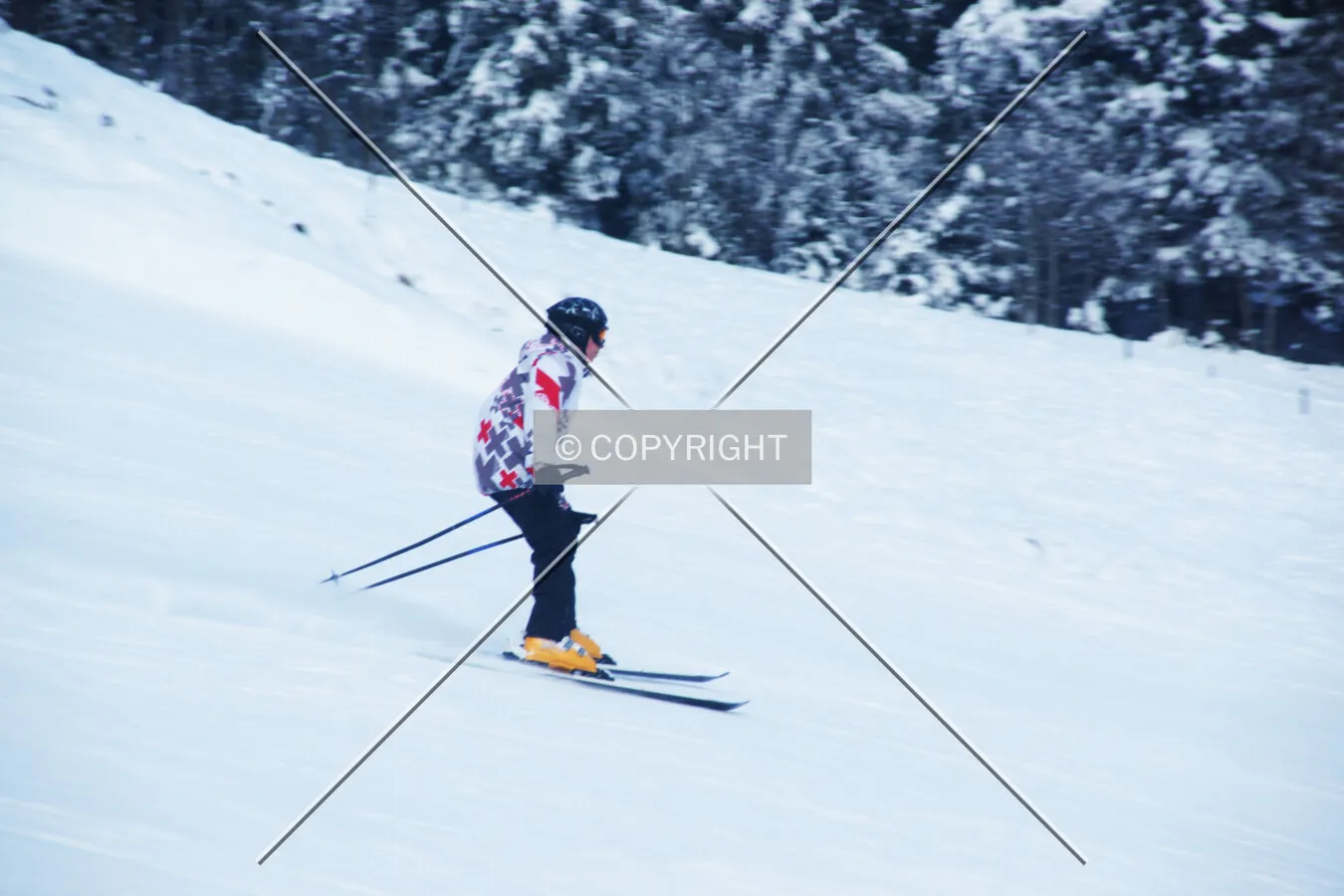 A man is skiing in the snow