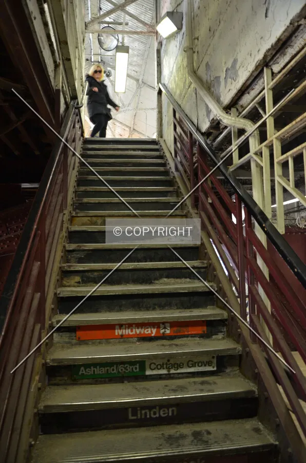 Looking up stairway to the western platform from the mezzanine level. March 7, 2015.