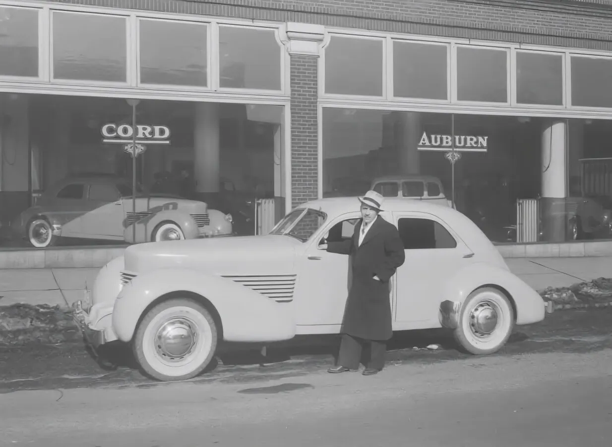 A new Cord parked out front; February 10, 1936