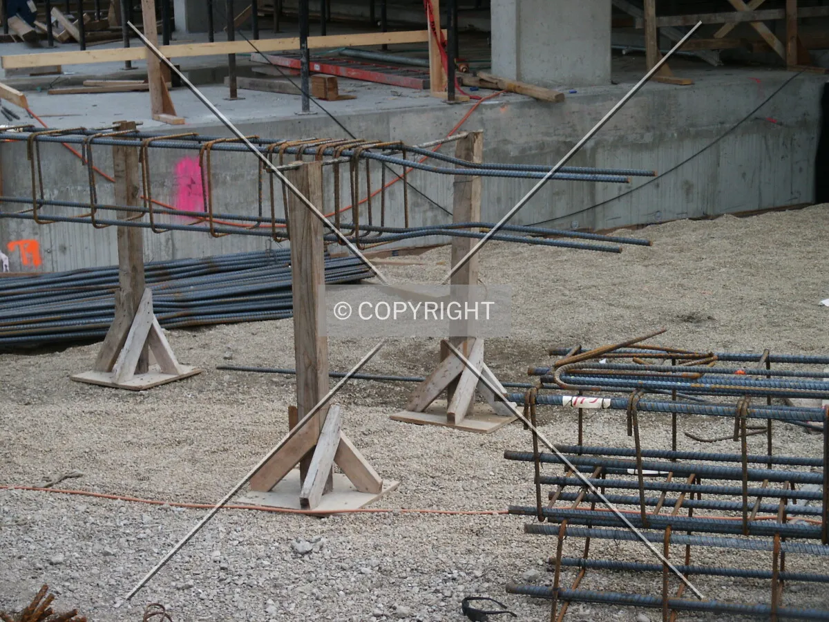 Reinforcing rods on wooden posts
