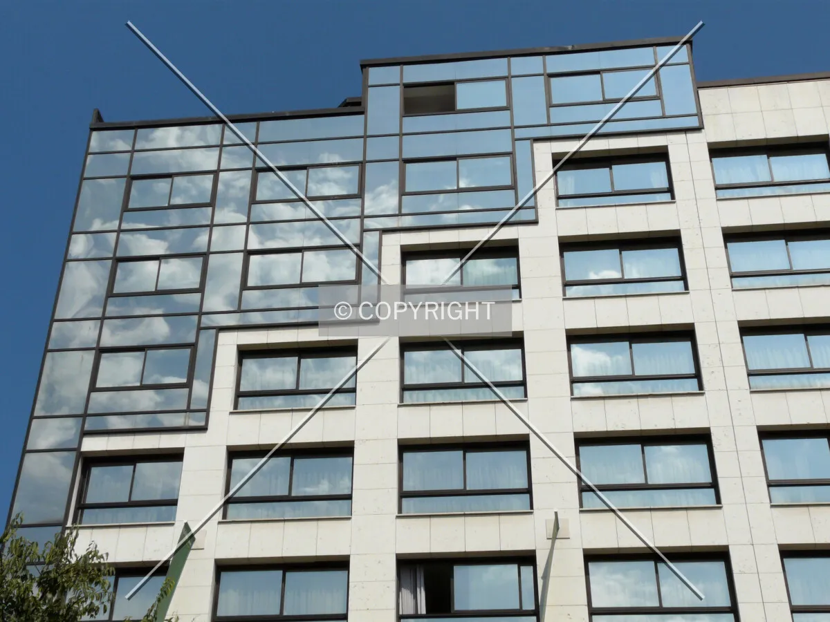 Clouds reflected in the glass facade