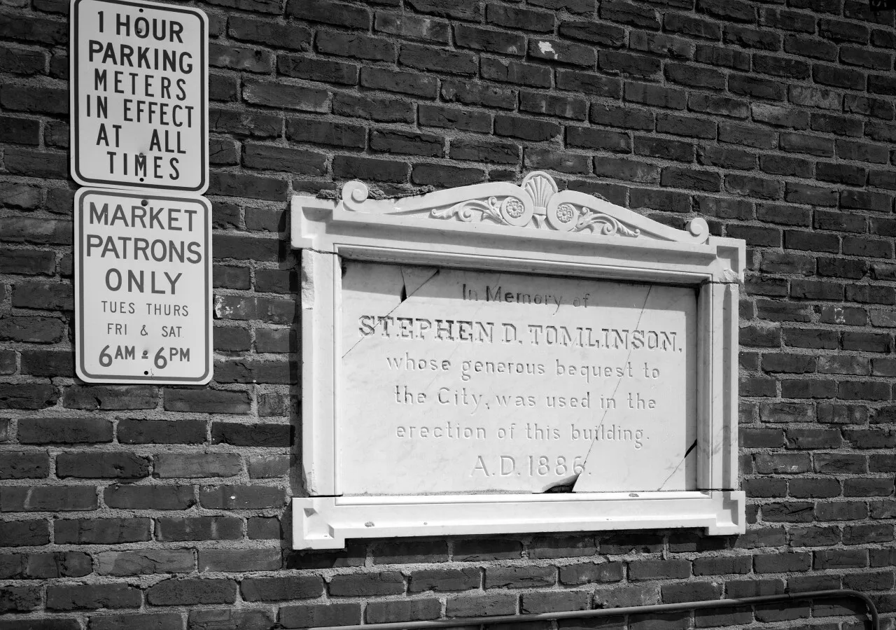 Plaque on southwest corner