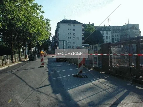 The street along the construction site to the Main river