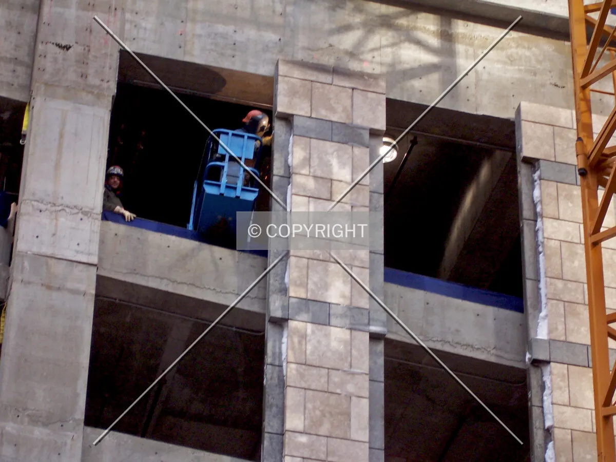 Facade clading on the south side of the tower base
