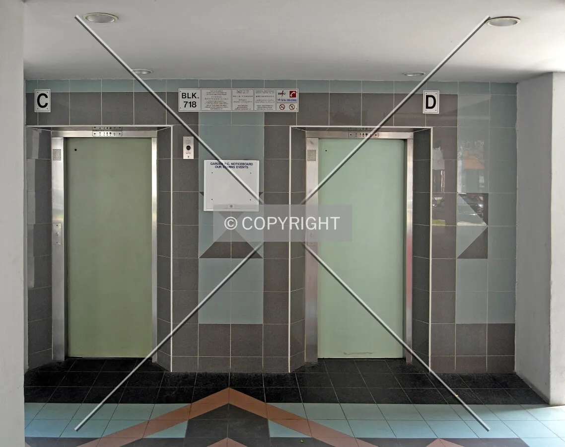 View of the elevators on the void deck