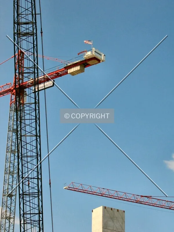 Three cranes and top of the elevator shaft, from West River Road