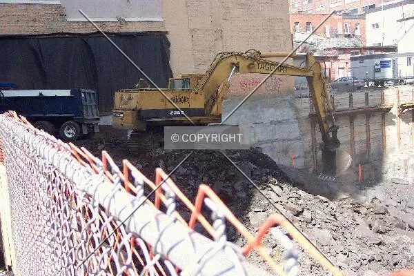 Loading the rock into the dump trucks for removal from the site