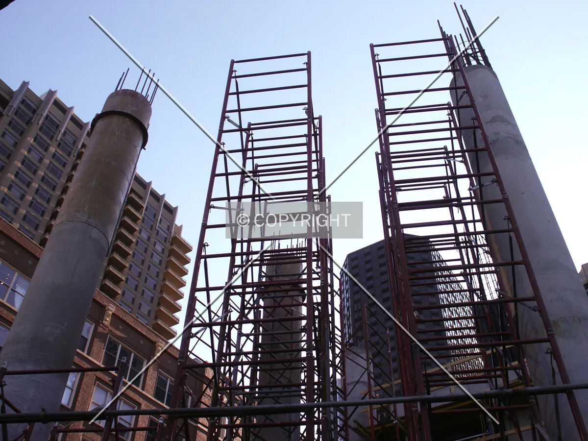 Looking up at the columns and scaffolding on the east side