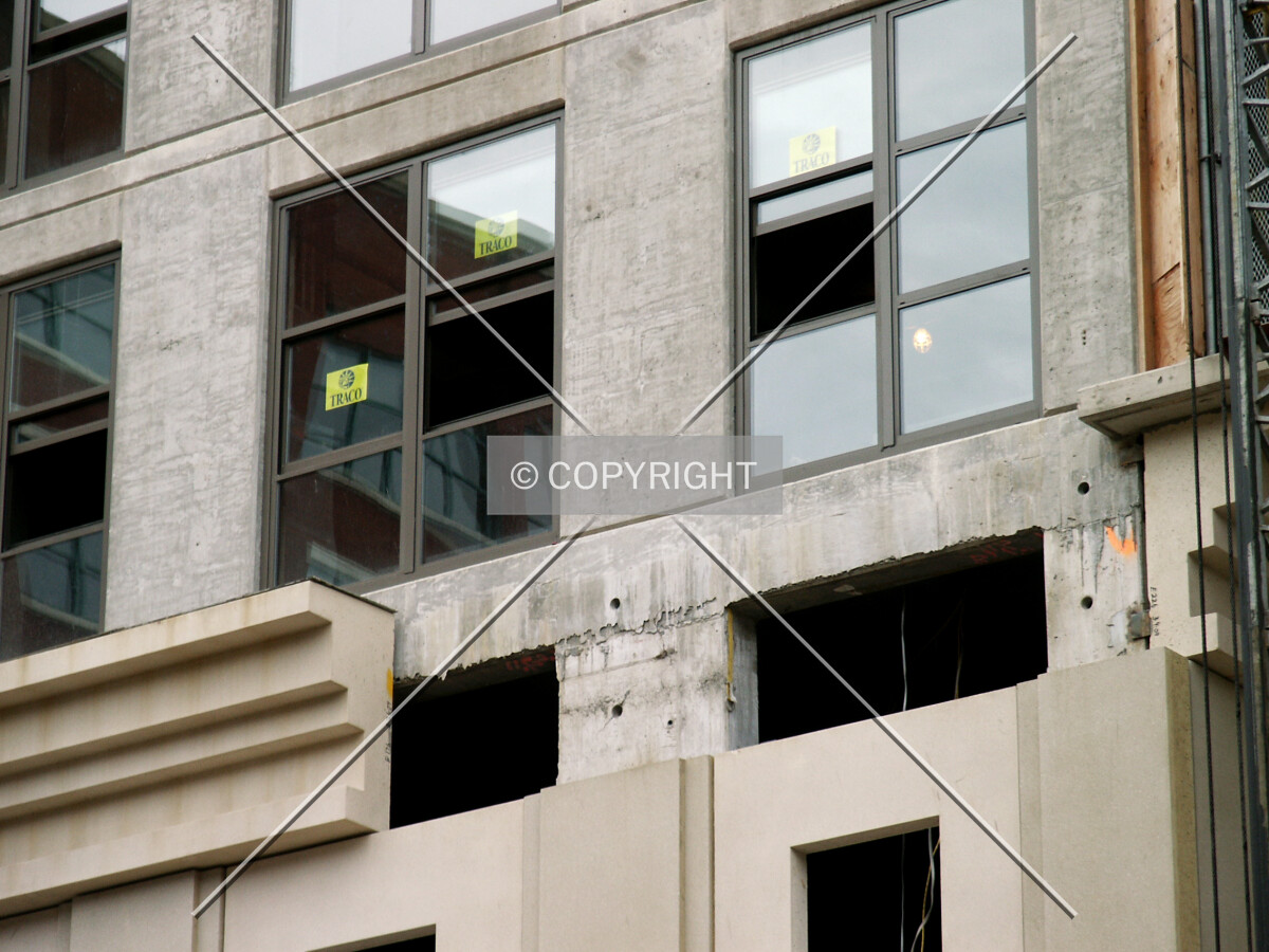 Facade detail near the base on 11th Street