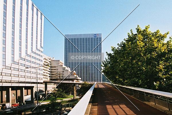 Tour Neptune (background) as seen from the elevated walkway next to Ibis/Novotel Hotel (left)
