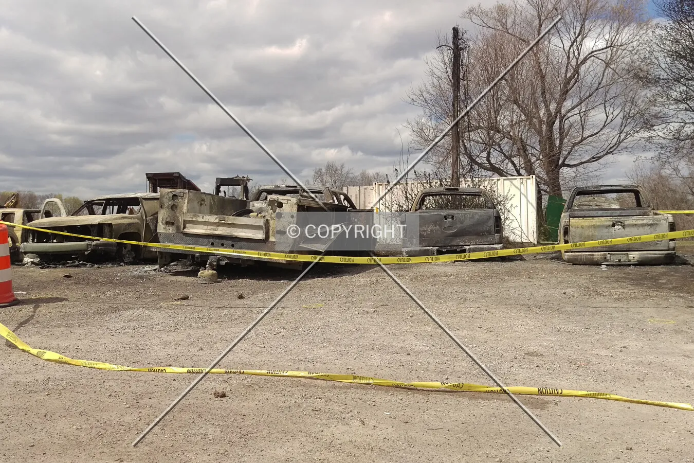 Burned construction worker vehicles at the site of a gas explosion during the construction of the future Villas at Nottingham neighborhood in Maryville, Illinois; April 8, 2016