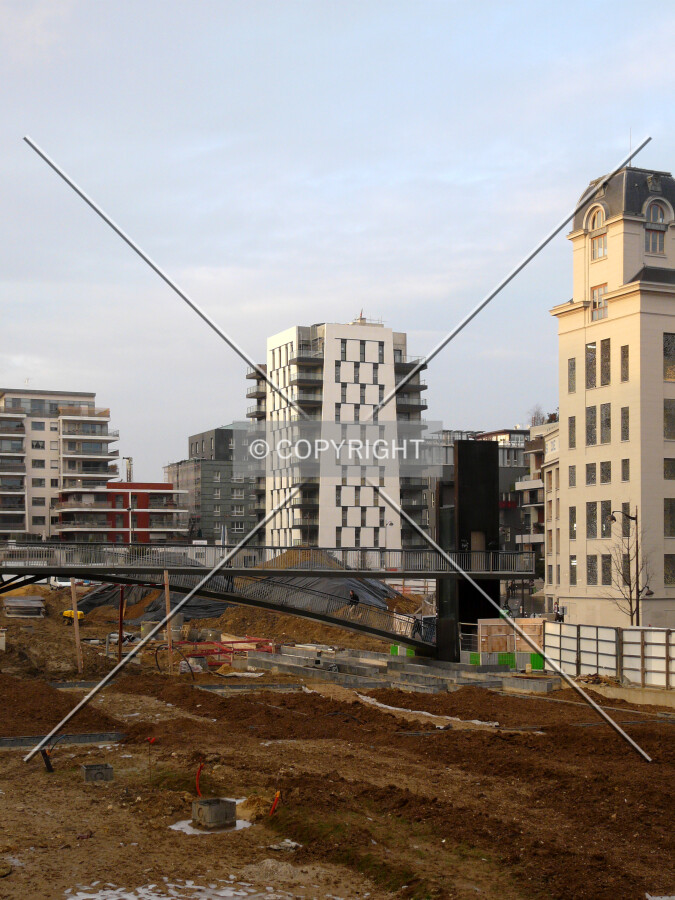 Looking north from Rue Françoise Dolto, with the future public park 'Jardin des Grands Moulins' in foreground
