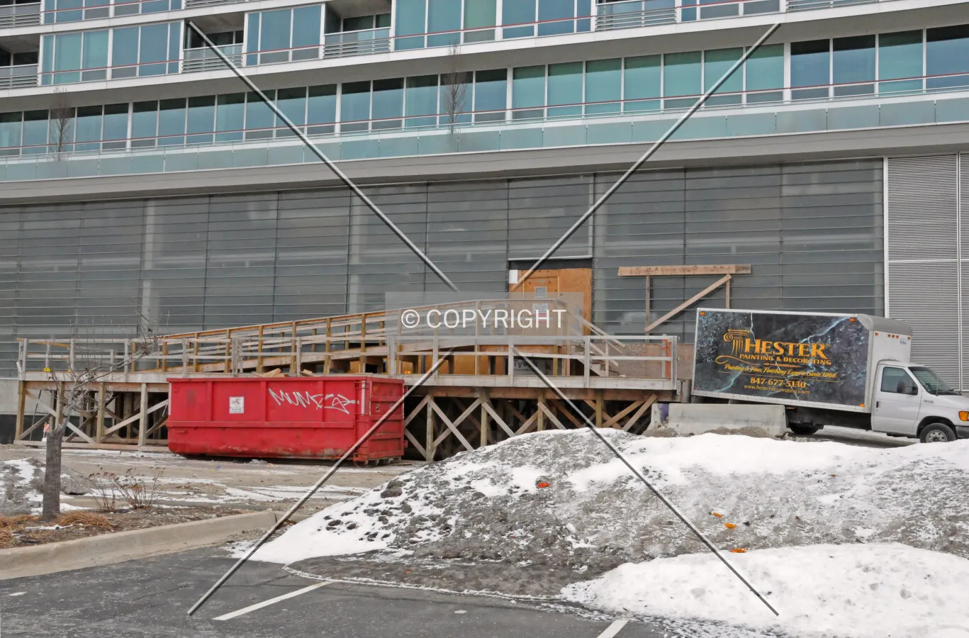 North side of the Maple Tower with a construction entrance and access ramp still in use