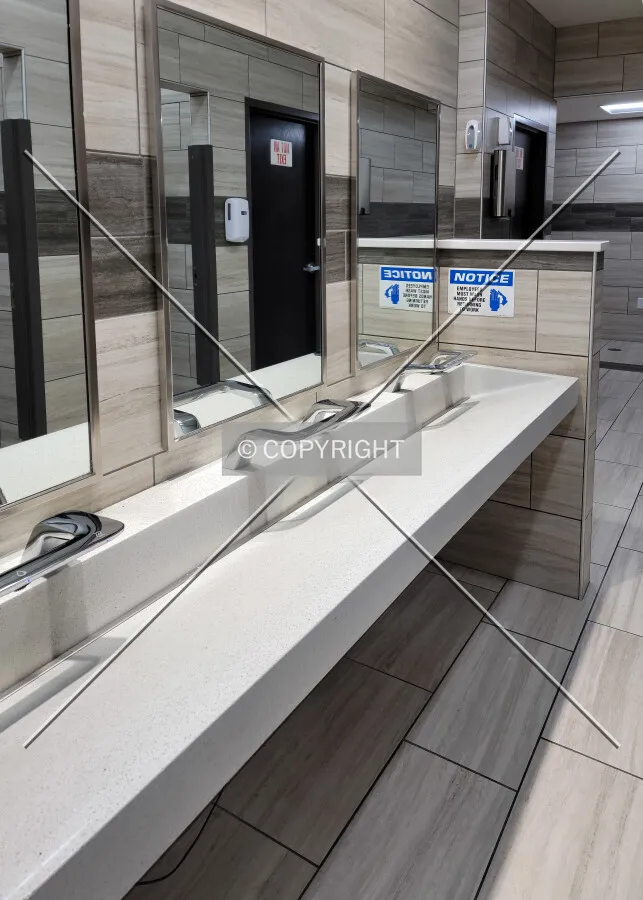 Sinks in the men's restroom; April 10, 2021