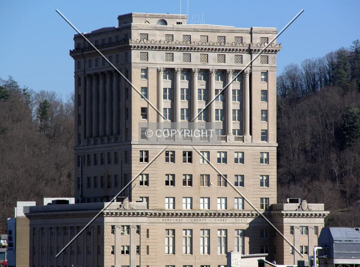 Top half of the building as seen from atop the Civic Center parking garage to the northwest
