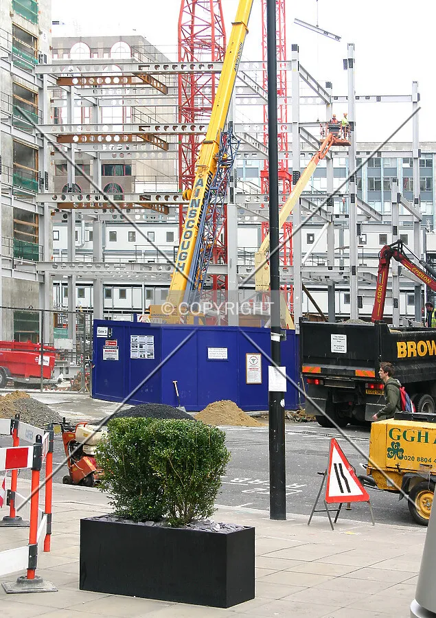 View across Ropemaker Street of the rising steelwork