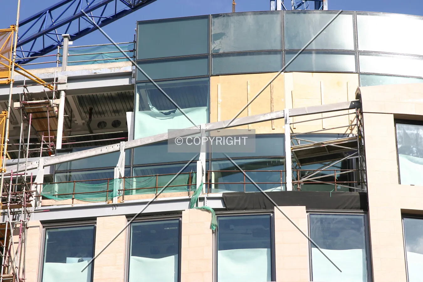 Stone cladding nearing completion on the south side