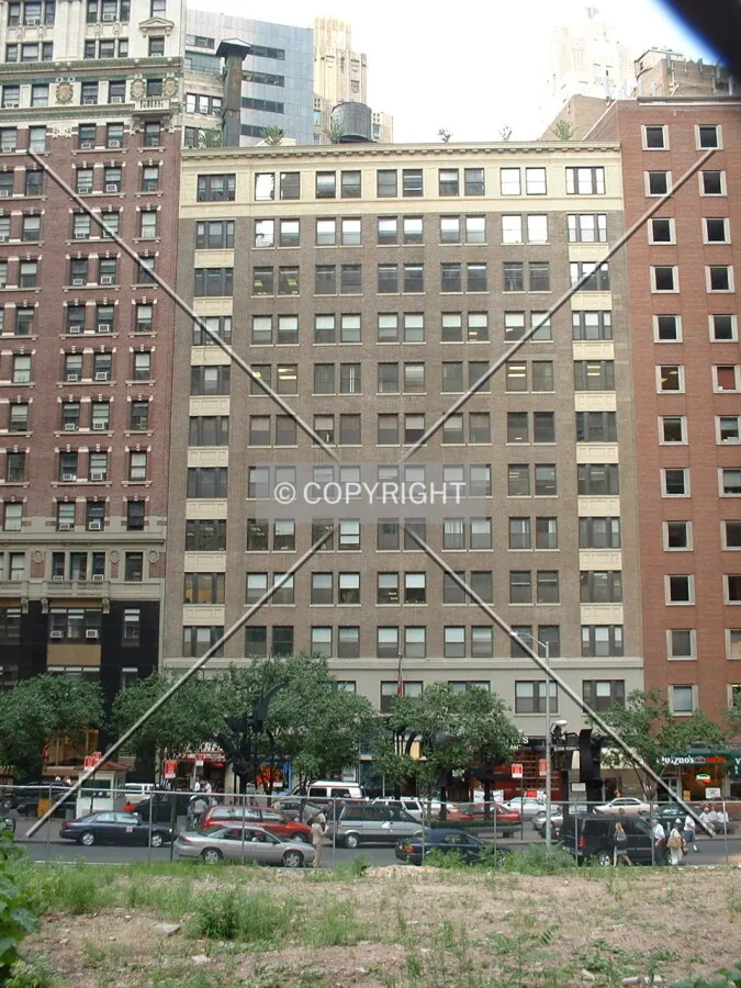 View from Pine Street across one of the only empty lots Downtown