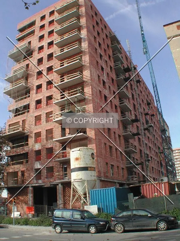 View of the back and south facade from a bus stop