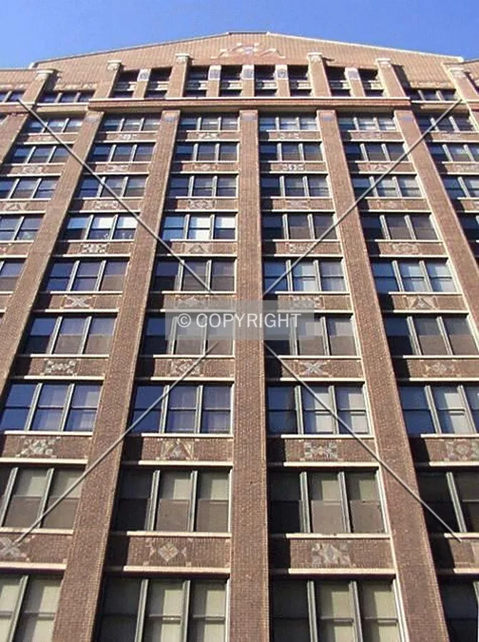 Looking up the east facade from Dearborn Street
