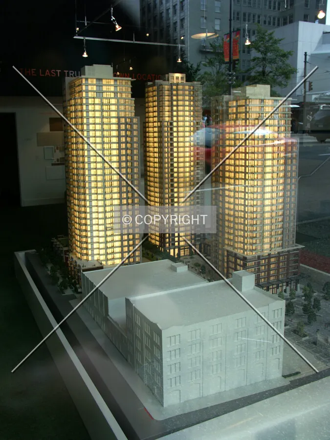 Model of complex seen through window of Presentation Centre at 701 West Georgia