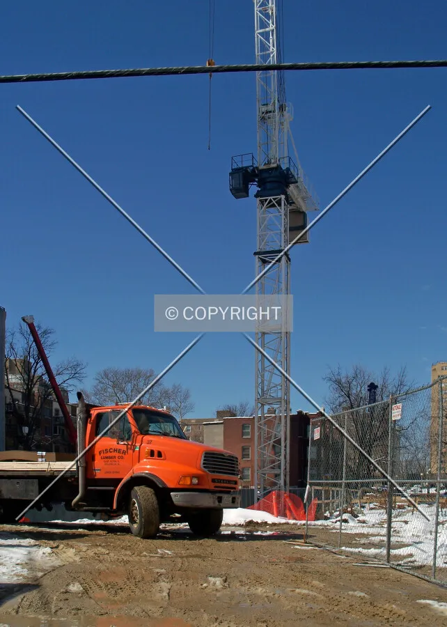 Construction truck and crane from the east