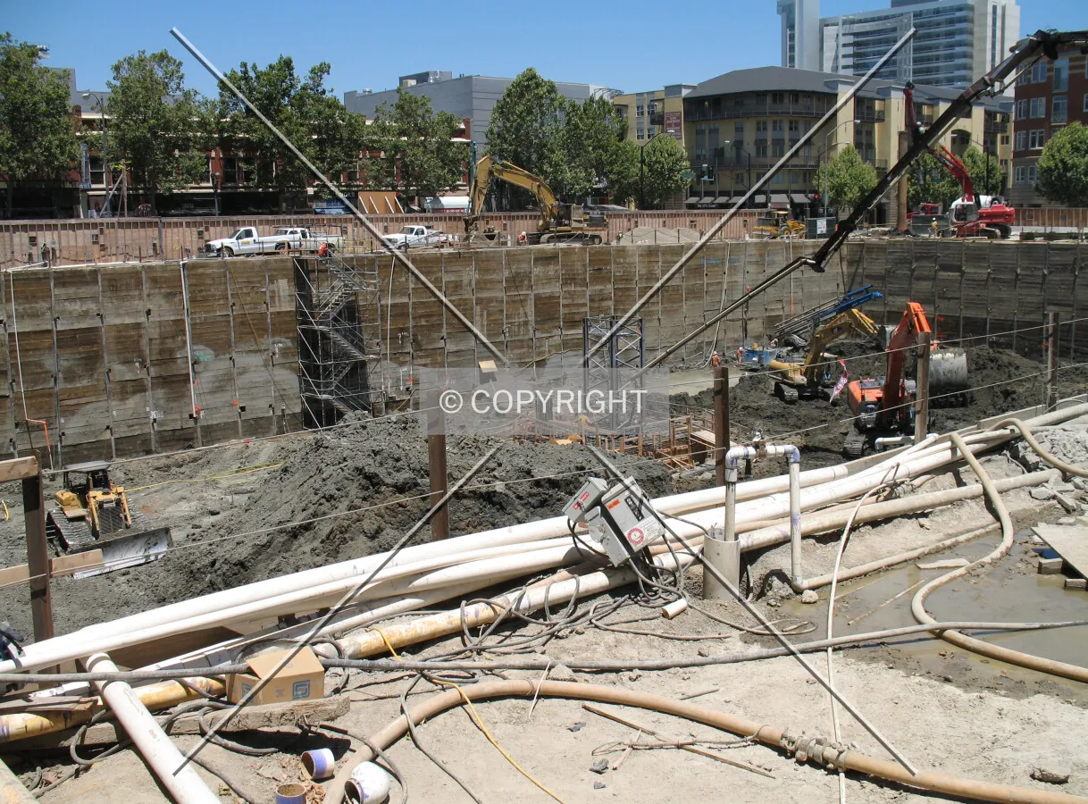 Looking northeast across the excavation pit as concrete is poured for the crane-tower foundation