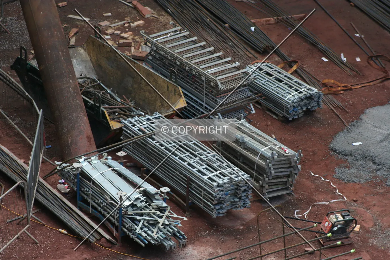 Looking into the site at construction equipment
