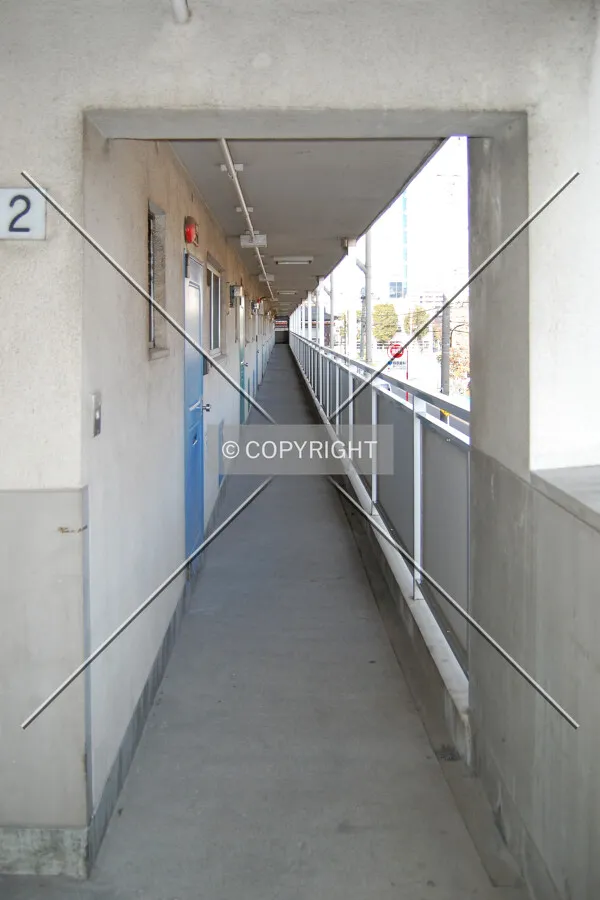 Access balcony to second floor apartments