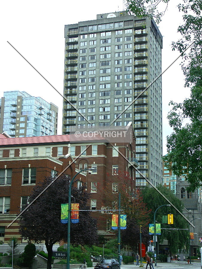 South facade rising above St. Paul's Hospital