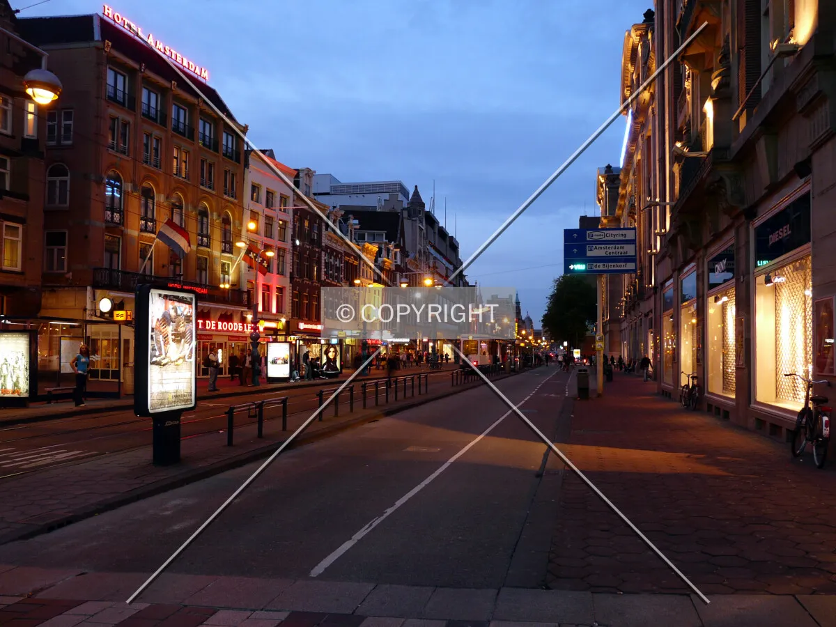 Looking northeast on Damrak at dusk