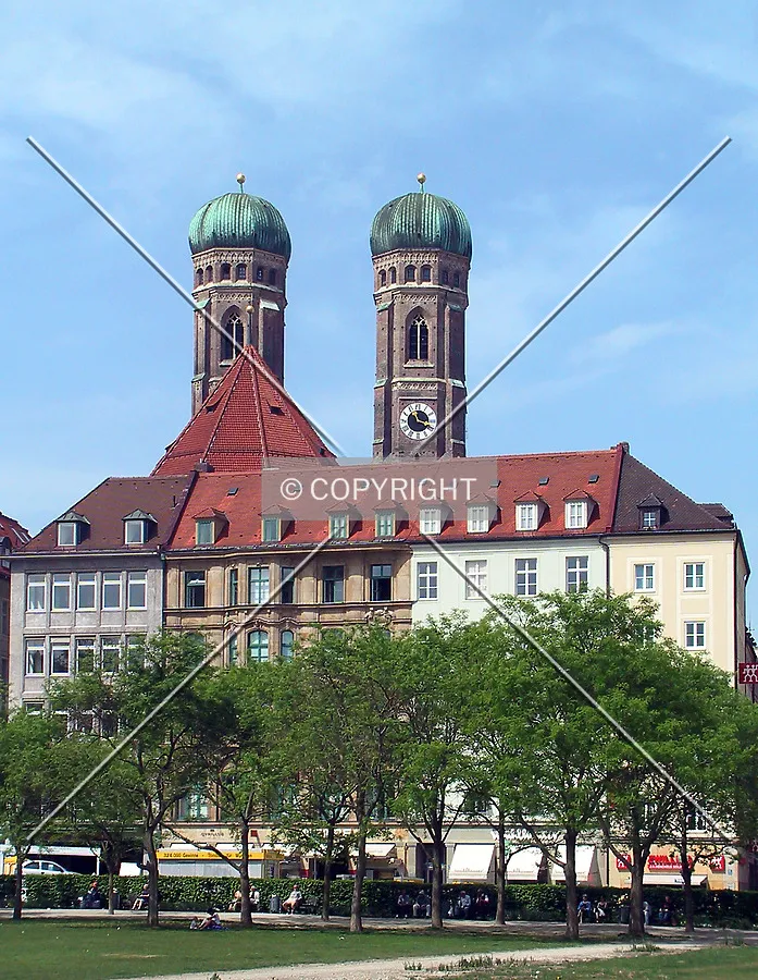 Towering over a neighboring building