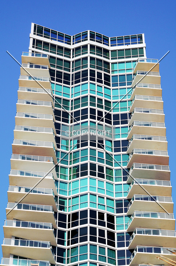 View of the top floors from the east along the beach