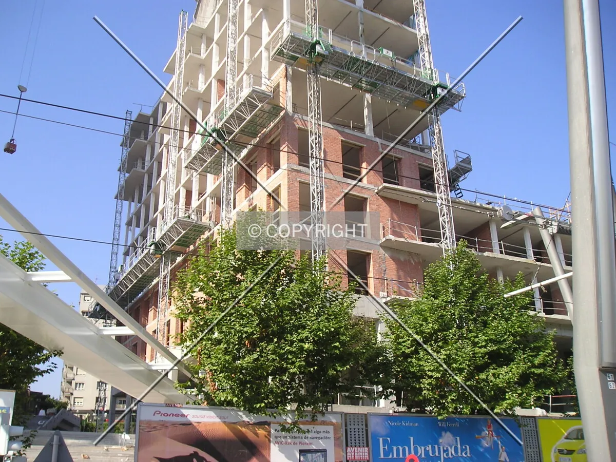 From the base of the building with part of the footbridge