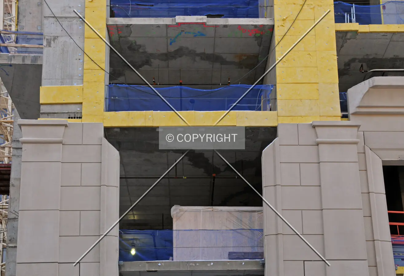 Precast concrete facade along the base's north side