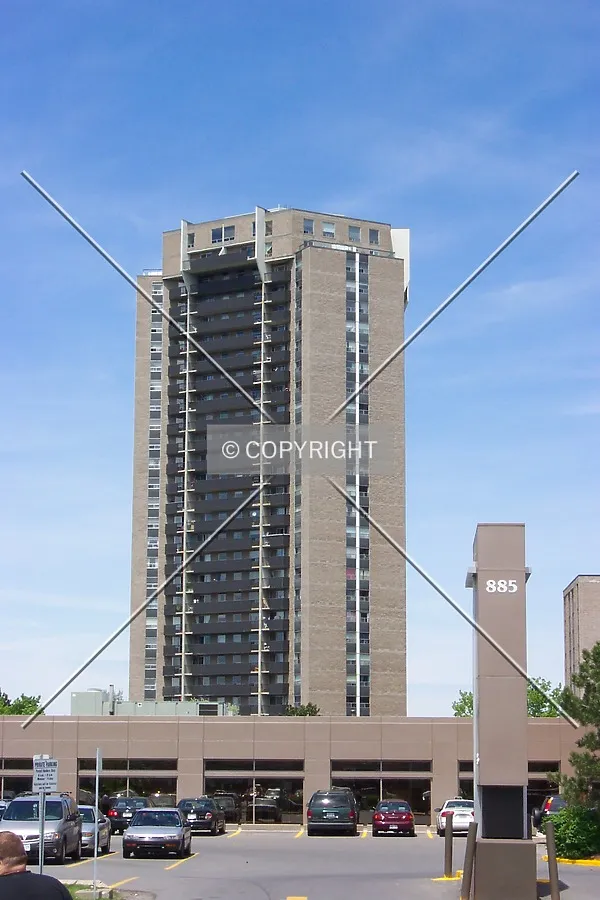 South facade, as seen from the shopping plaza at 885 Meadowlands Drive