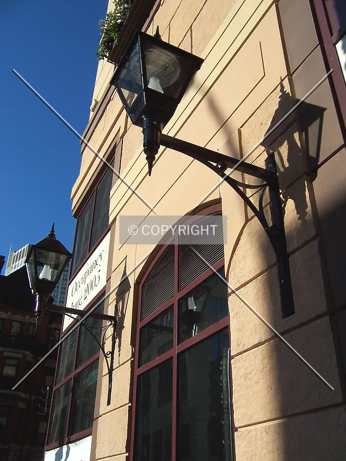 Light fixtures along the sidewalk