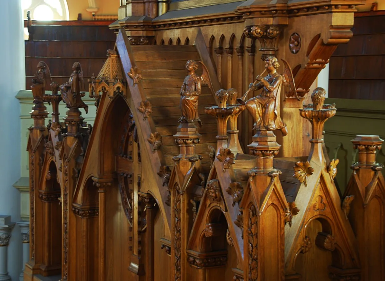 The decorations above the organs