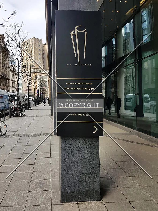 Sign showing the directions to the observation deck of MAIN TOWER