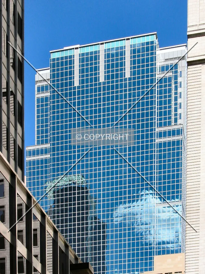 Top floors from 2nd Avenue South, framed by One Financial Plaza and 501 Marquette